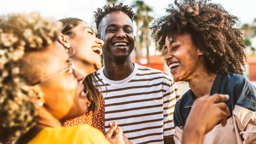 Young happy people laughing together